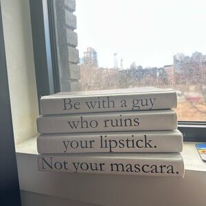 E Lawrence decorative book stacks